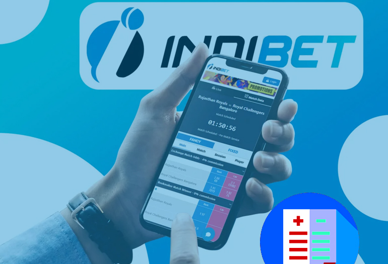 a person holding a phone Indibet Betting and Casino